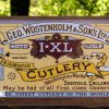 George Wostenholm & Son's I*XL Tin Sign