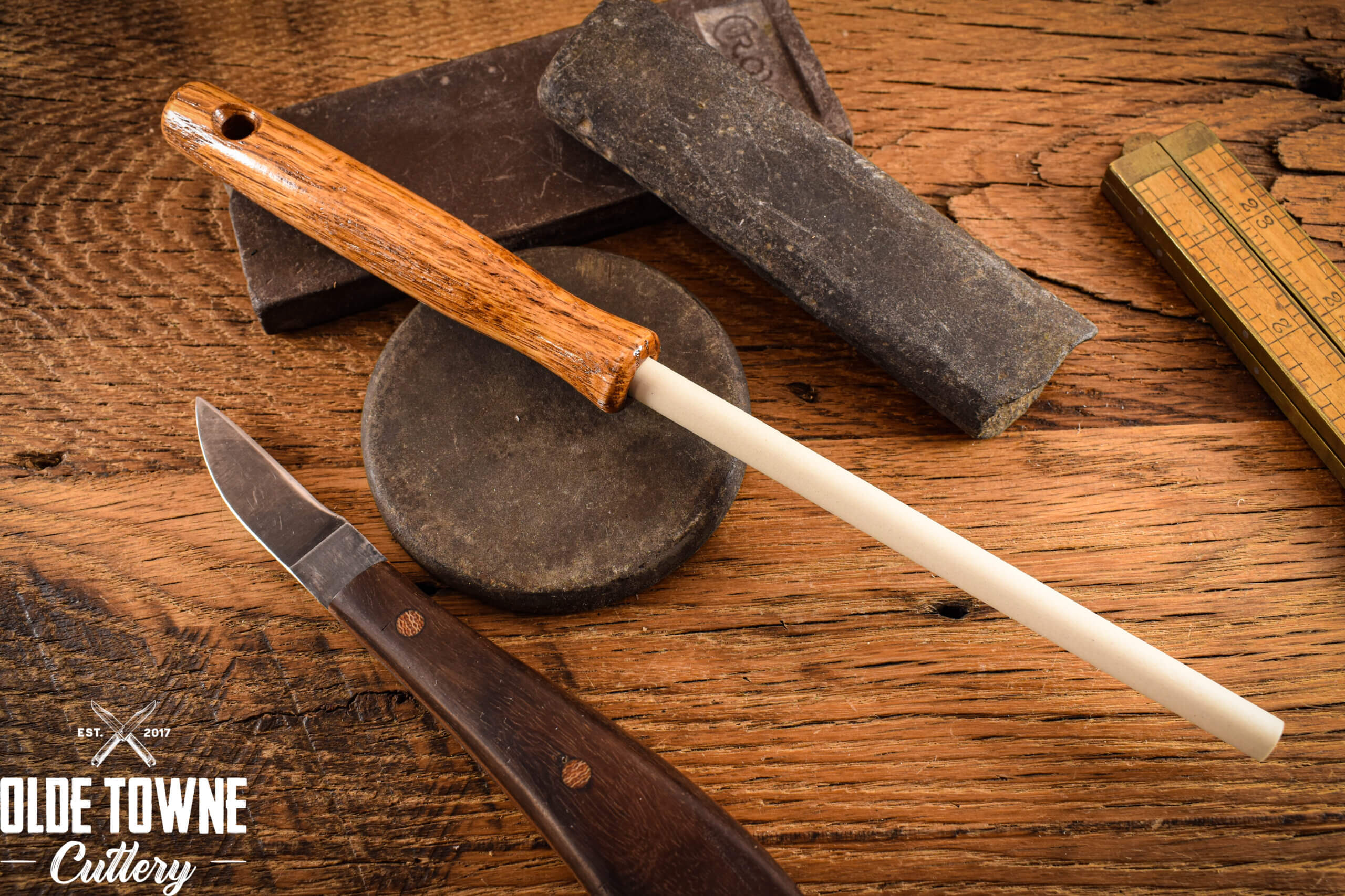 Ceramic sharpening rod in oak wood handle.